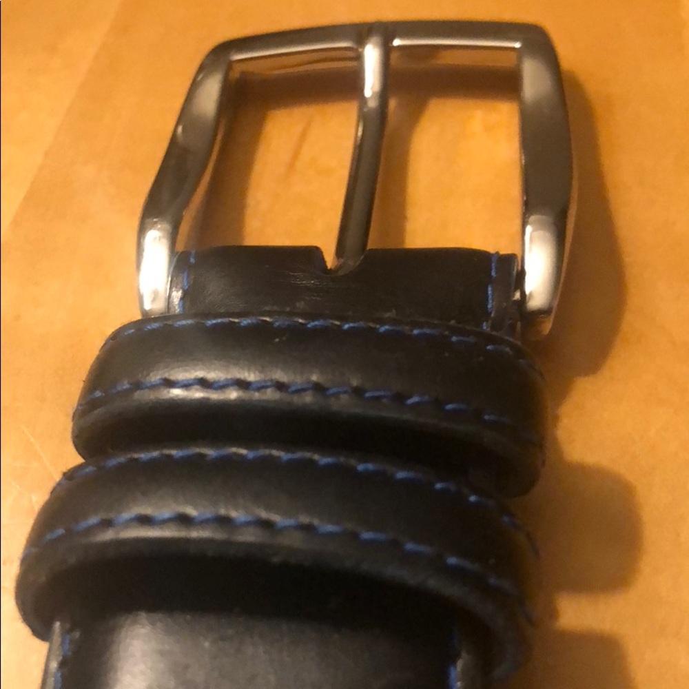 Navy blue belt with light blue stitching: worn